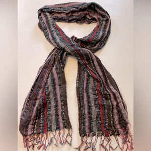 Maurice’s Infinitely scarf w/fringes measure 68’ long & is 💯% nylon multi color